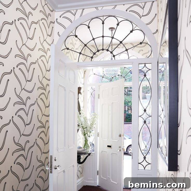 Transom Windows: A Complete Guide 15 Entryway with wallpaper and arched transom window with black outline