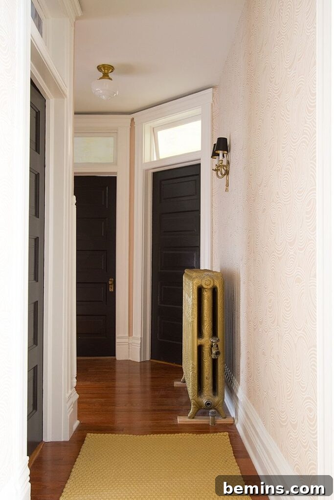 Transom Windows: A Complete Guide 6 Two black doors with transom windows above in hallway