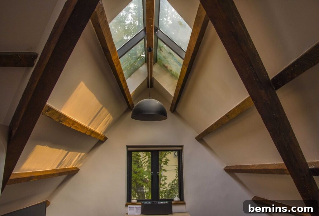 Bright attic space with painted ceiling