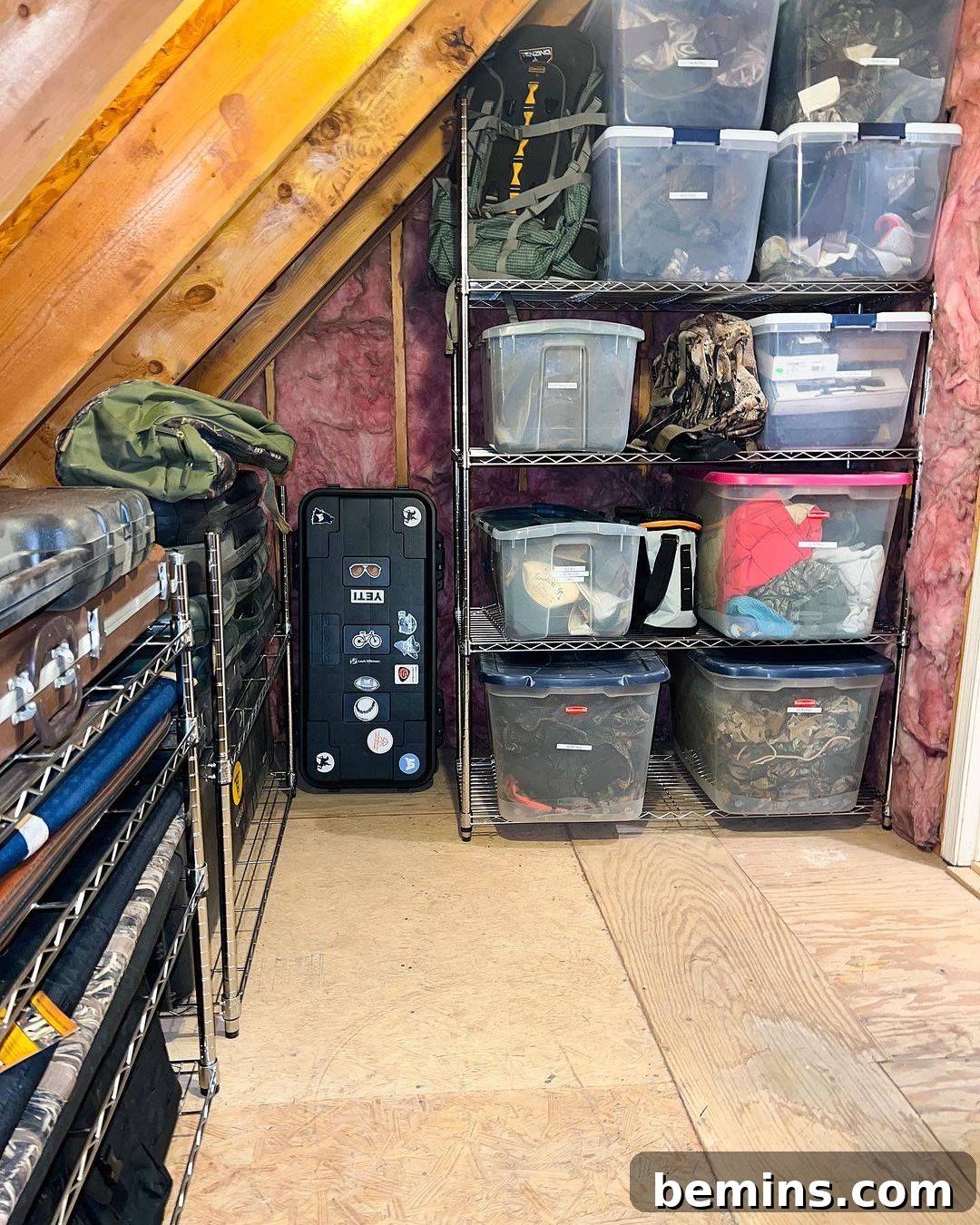 Clear storage bins stacked in an attic
