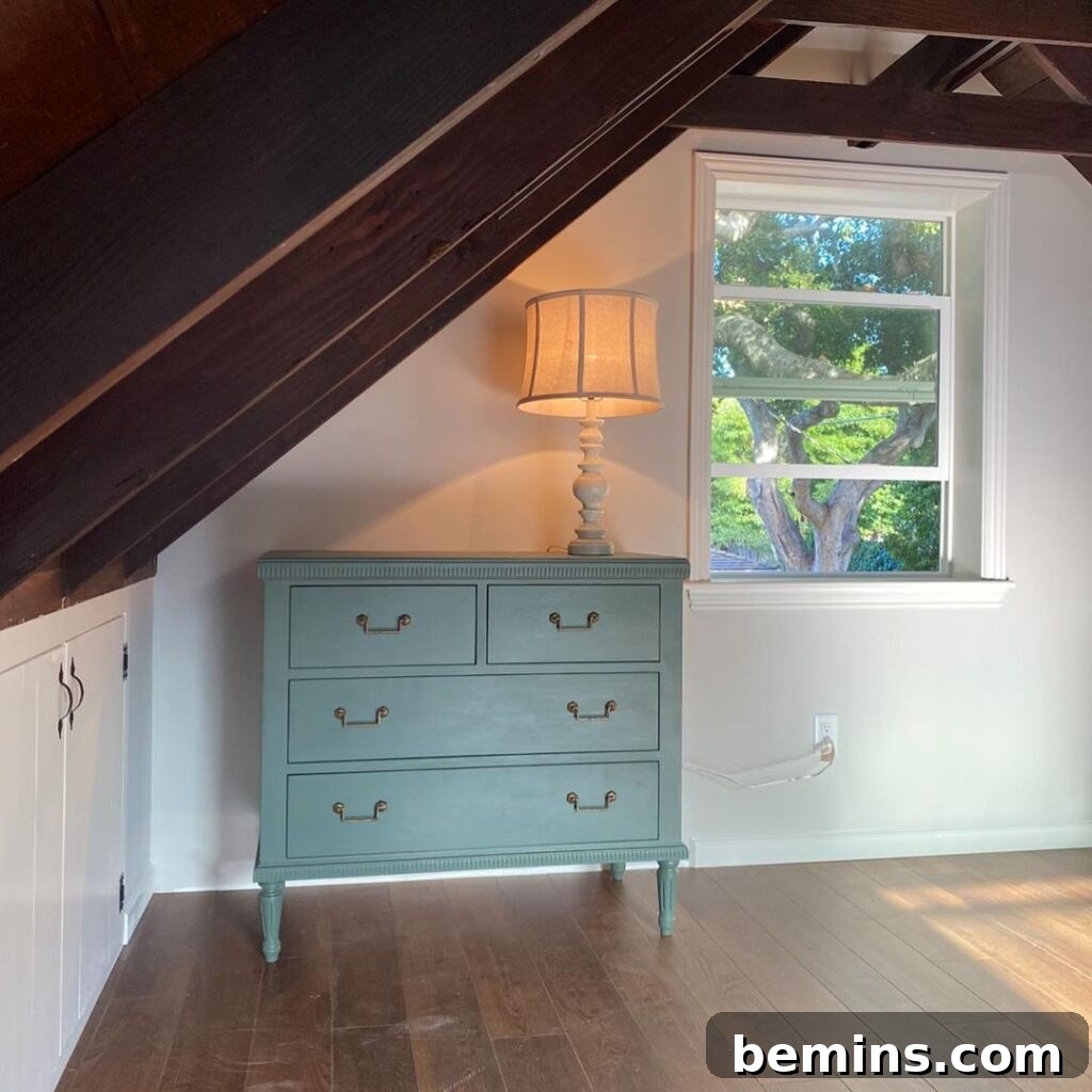 White attic with blue drawers