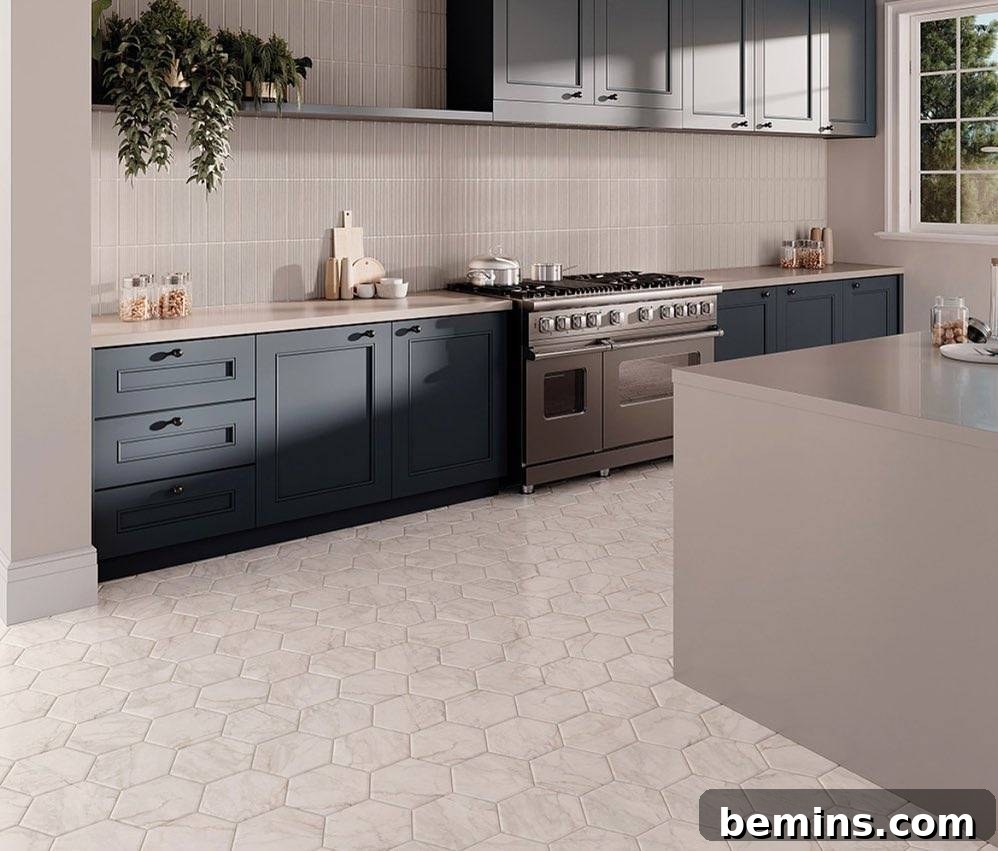 Stylish kitchen with cream-colored ceramic kitchen floor and a gray island.