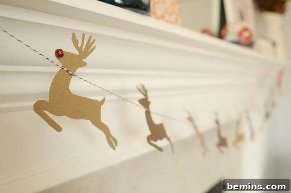 A charming Santa and reindeer garland for a festive touch.