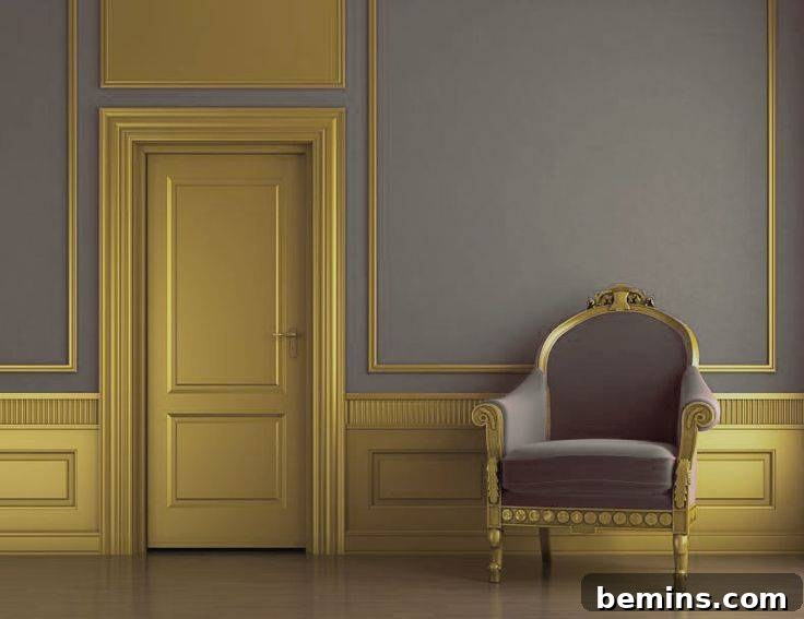 Wainscotting in room with gold door, gold wainscotting trim and gray walls. Gray and gold accent chair.