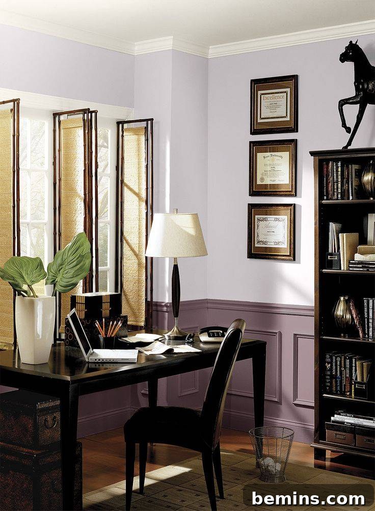 Office with three window panels, off white walls and lavendar wainscoting