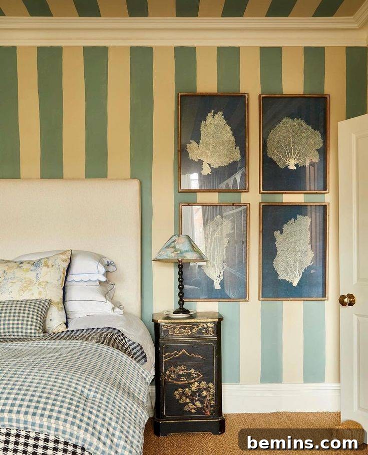 Budget Bedroom Wallpaper: Stylish Upgrades That Won't Break the Bank 17 Light green and beige striped wallpaper creating a calming bedroom backdrop