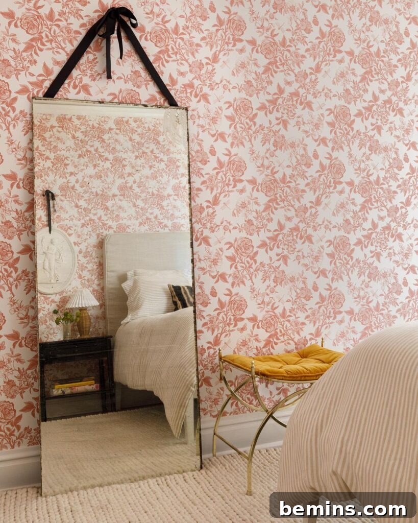 Budget Bedroom Wallpaper: Stylish Upgrades That Won't Break the Bank 5 Pink and white floral wallpaper creating a feminine bedroom ambiance