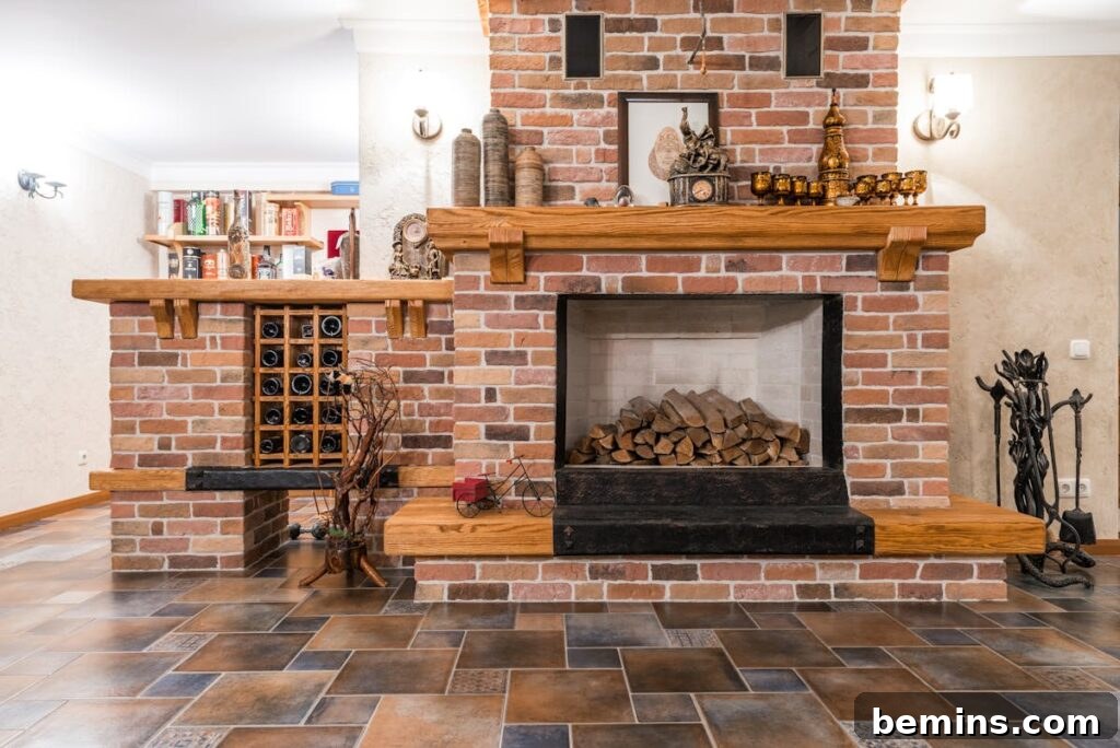 Brick fireplace with a neatly stacked pile of chopped woods inside.