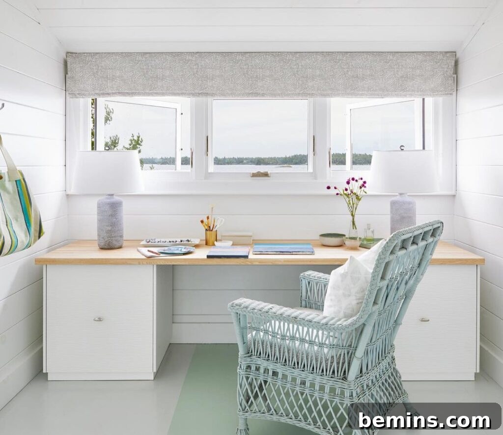 Striking IKEA BESTA Transformations for a Unique Home 11 White Ikea BESTA used as an office desk with wood countertop in front of large window