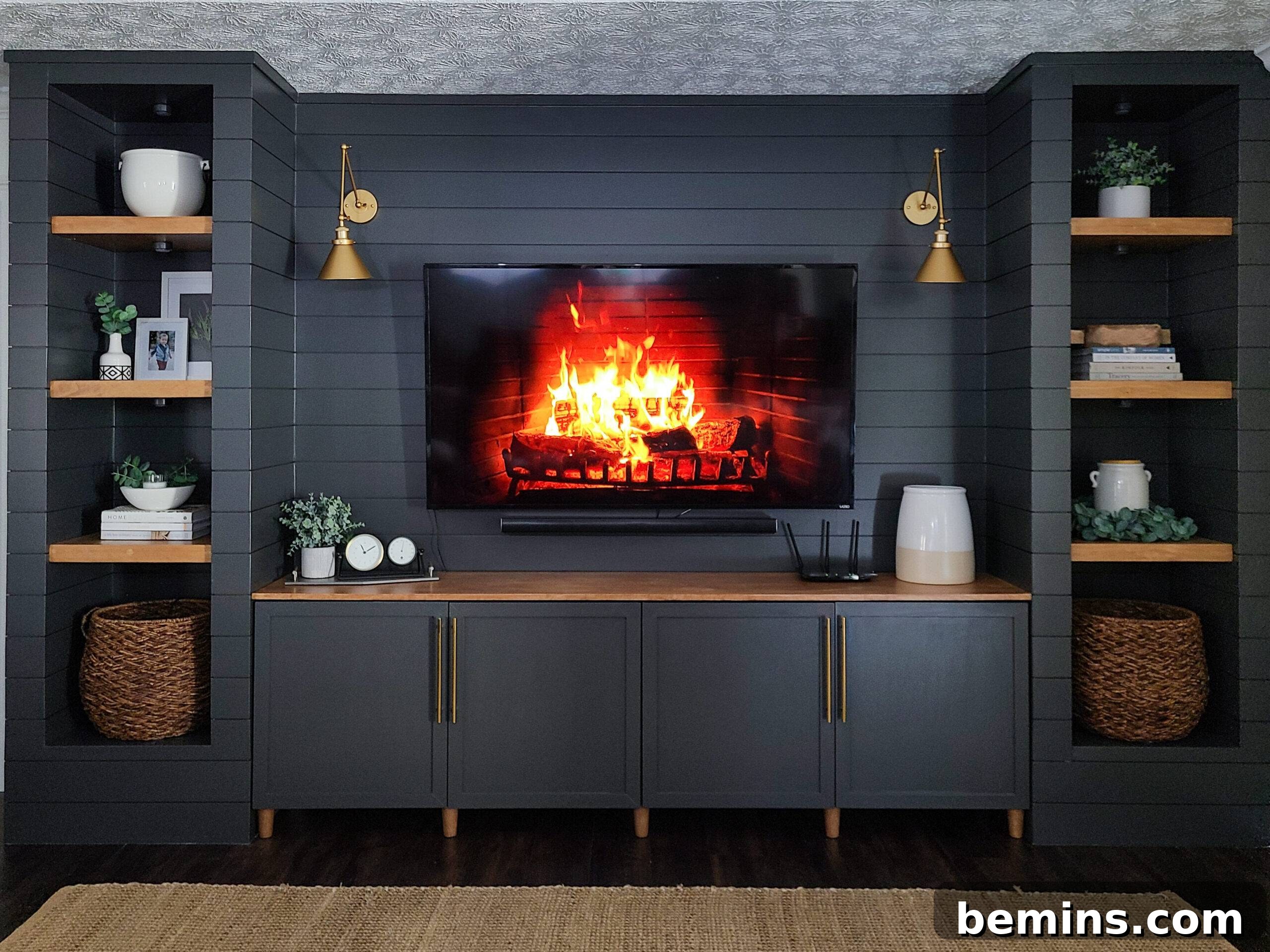 Striking IKEA BESTA Transformations for a Unique Home 7 Black built-in Ikea BESTA media unit with tv mounted on wall
