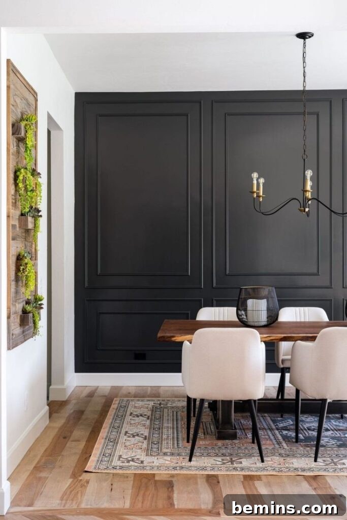 Inspiring Wainscoting: 15+ Dining Room Design Ideas 12 Dining room with full wall of black wainscoting