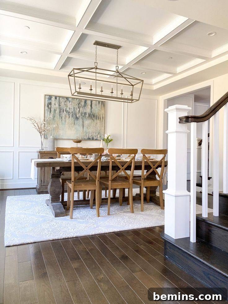 Inspiring Wainscoting: 15+ Dining Room Design Ideas 13 Large dining room with white rug and brown dining table in front of white wainscoting on wall