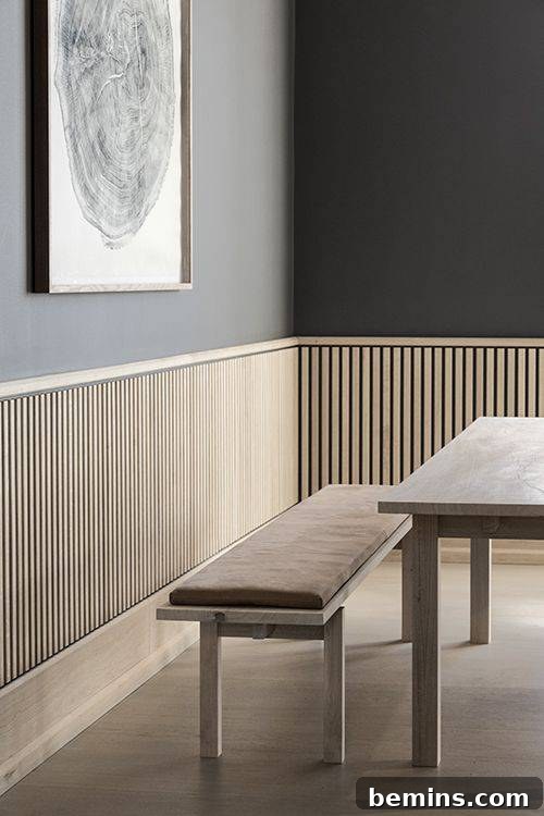 Inspiring Wainscoting: 15+ Dining Room Design Ideas 17 modern fluted light wood wainscoting in the dining room.