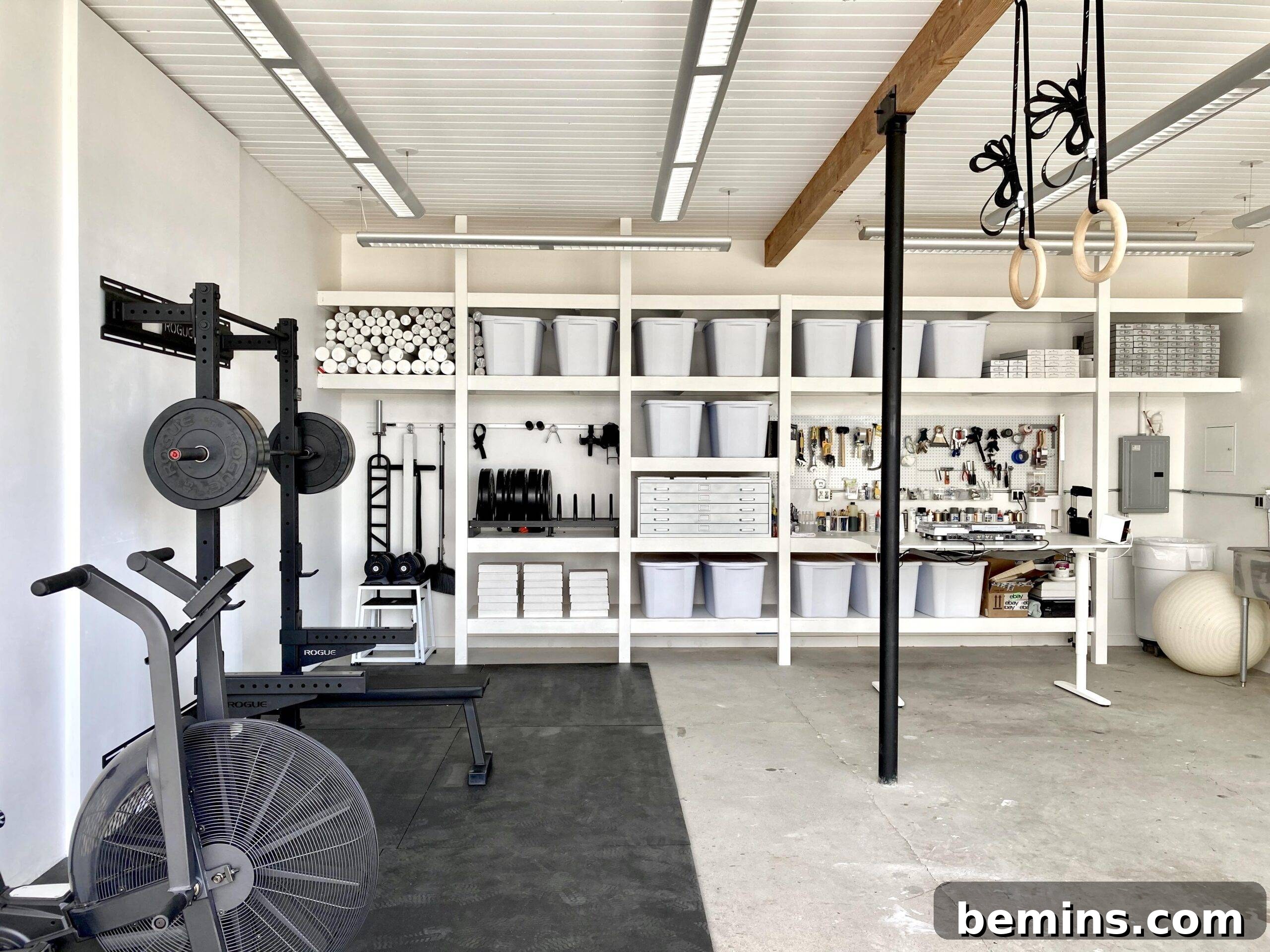 Elevate Your Workout Space: Inspiring Home Gym Designs 12 Large garage with shelving and weight racks