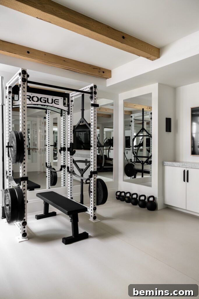 Elevate Your Workout Space: Inspiring Home Gym Designs 15 Black and white basement gym with large weight rack