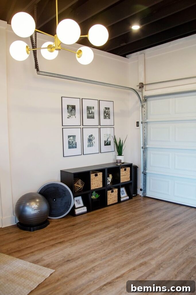 Elevate Your Workout Space: Inspiring Home Gym Designs 5 White garage with yoga ball and small gym set up