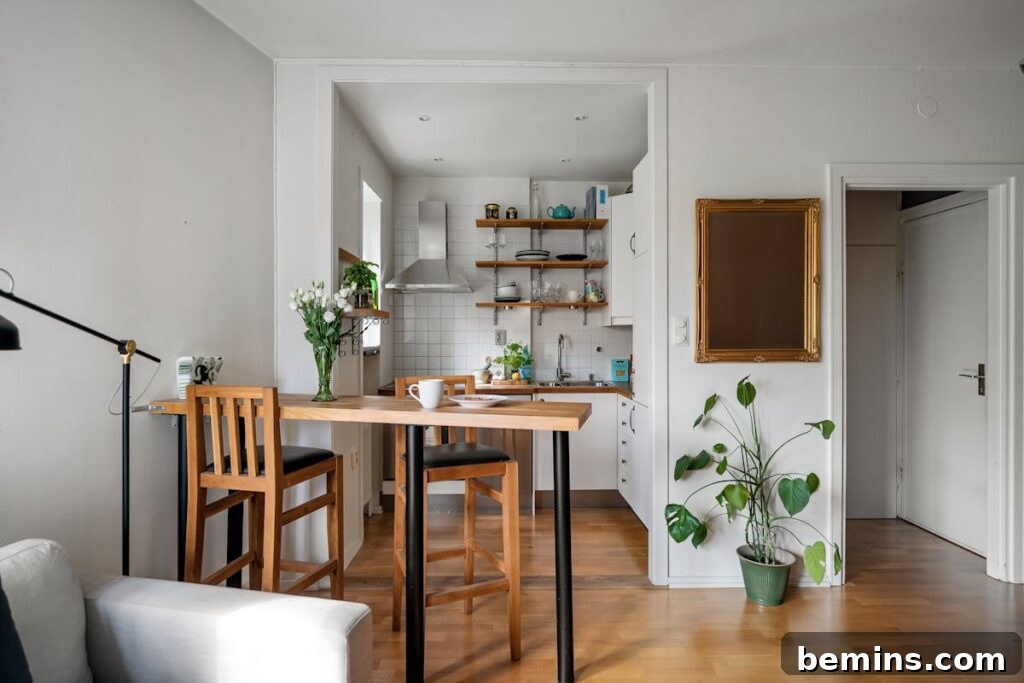 A cozy kitchen and dining area with wooden furniture, plants, and a modern Scandinavian design.
