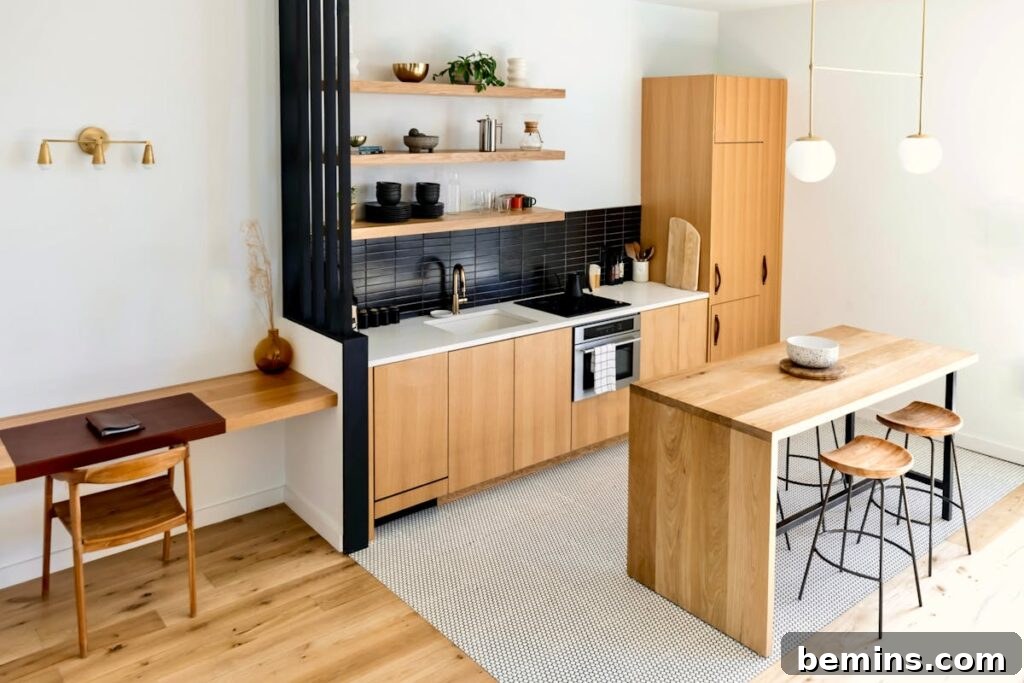 Light-filled modern kitchen interior with wooden furnishings and black accents.