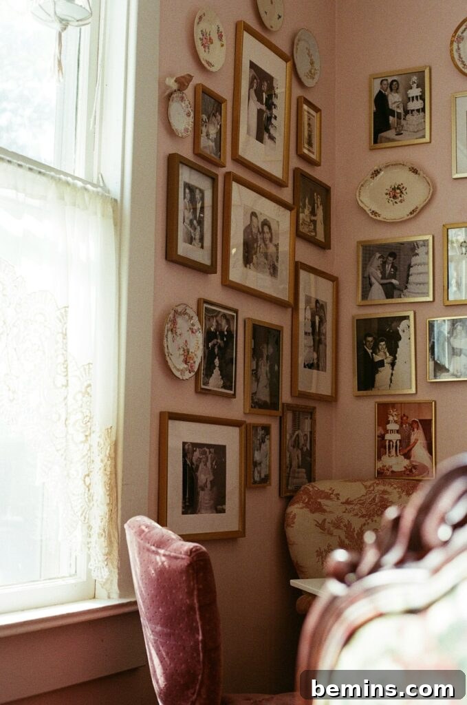 Command Strips Unleashed: Gallery Walls Without the Nail Holes 2 A room with a chair and a wall adorned with pictures, showcasing damage-free art hanging with Command Strips.