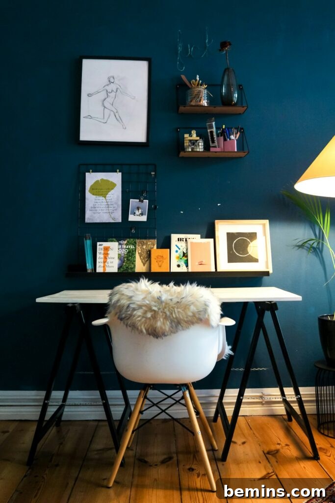 Command Strips Unleashed: Gallery Walls Without the Nail Holes 15 An organized workspace with personalized decor, showcasing the functionality of Command Strips in home office setups.