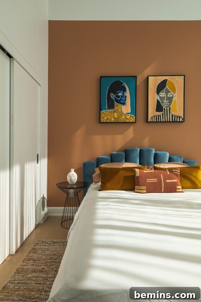 Command Strips Unleashed: Gallery Walls Without the Nail Holes 6 A bedroom setting showcasing the use of Command Strips for creating stylish headboard art without wall damage.