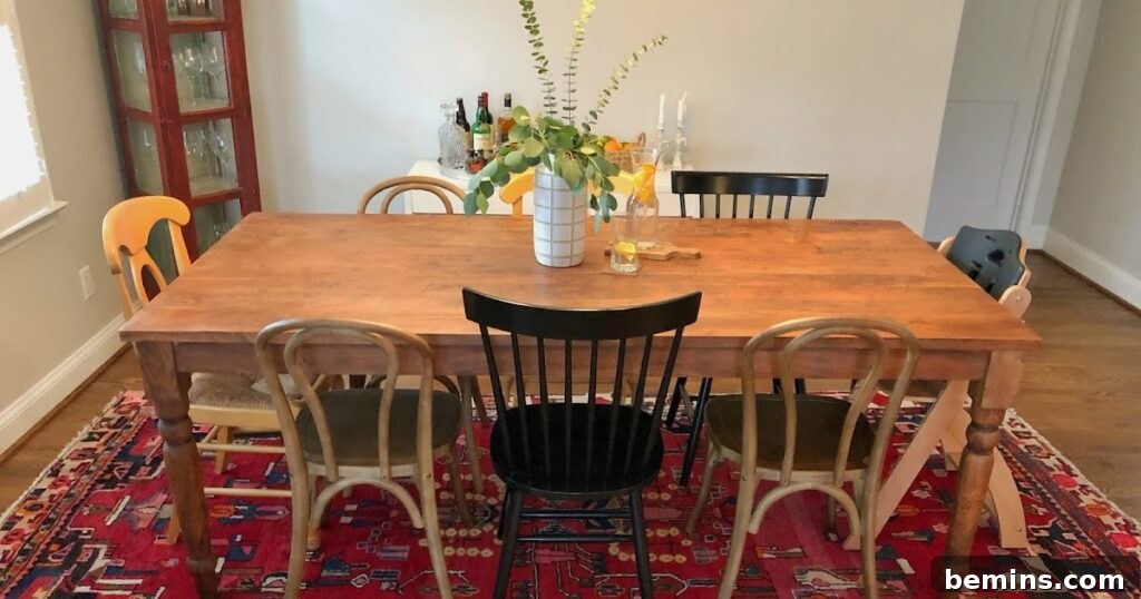 Brown table with brown and black chairs