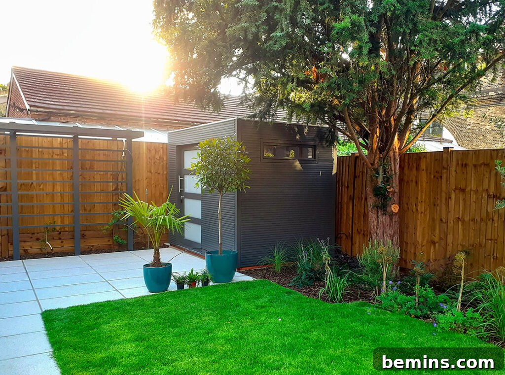 Black garden shed with grey door and flat roof