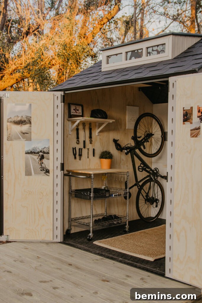 Brown shed with black bike hanging on interior wall