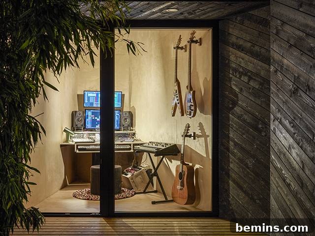 Shed with small music studio with guitars and computers