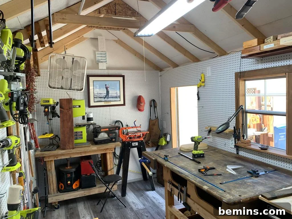 Interior of shed workshop with workbench and tools