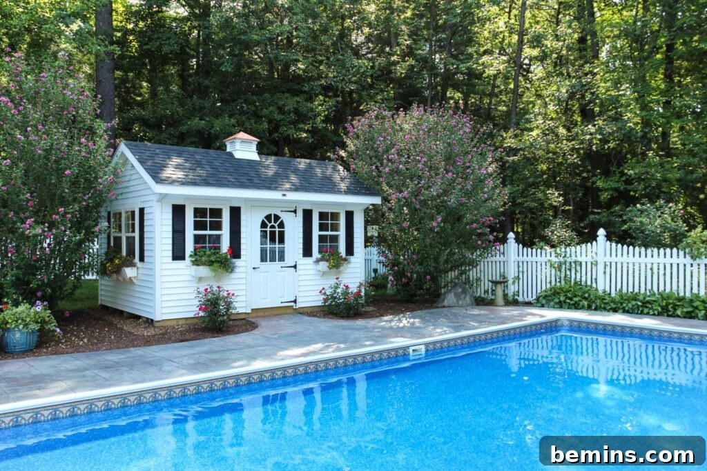 Large blue pool with white shed nearby