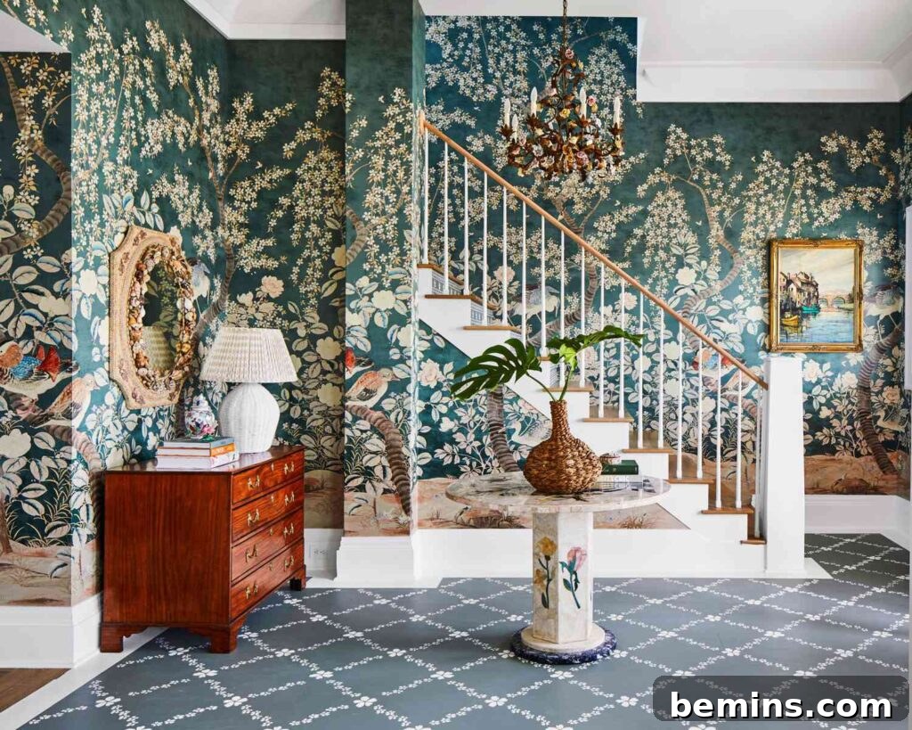 Elevate Your Entryway: Stunning Foyer Design Inspirations 3 Green floral wallpaper behind brown stairs in foyer