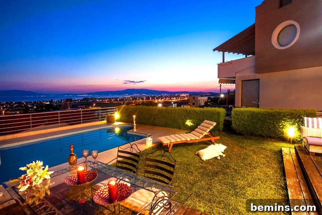 Effortless Home Oasis: Your Guide to a Summer Staycation 18 Experience a tranquil sunset by the pool with stunning views in Greece.