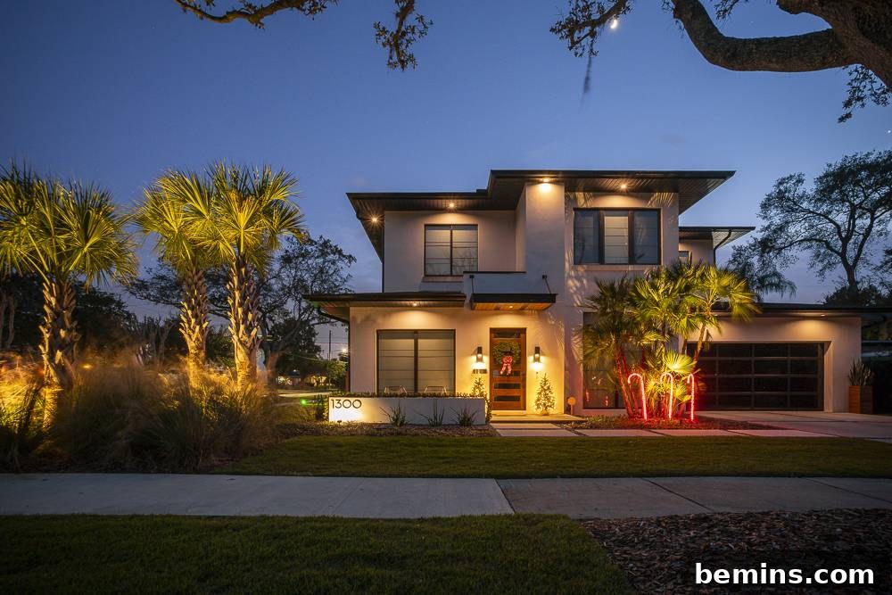 Transform Your Garden with Brilliant Uplighting Designs 12 House with uplights highlighting large palm trees
