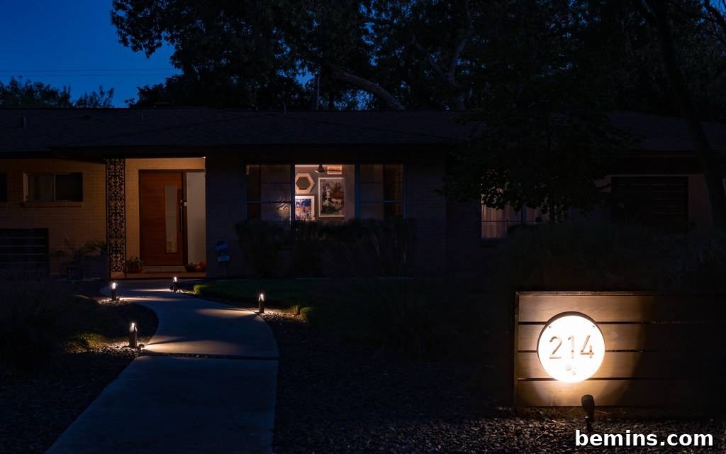 Transform Your Garden with Brilliant Uplighting Designs 15 Close-up of a brass uplight fixture in a garden setting