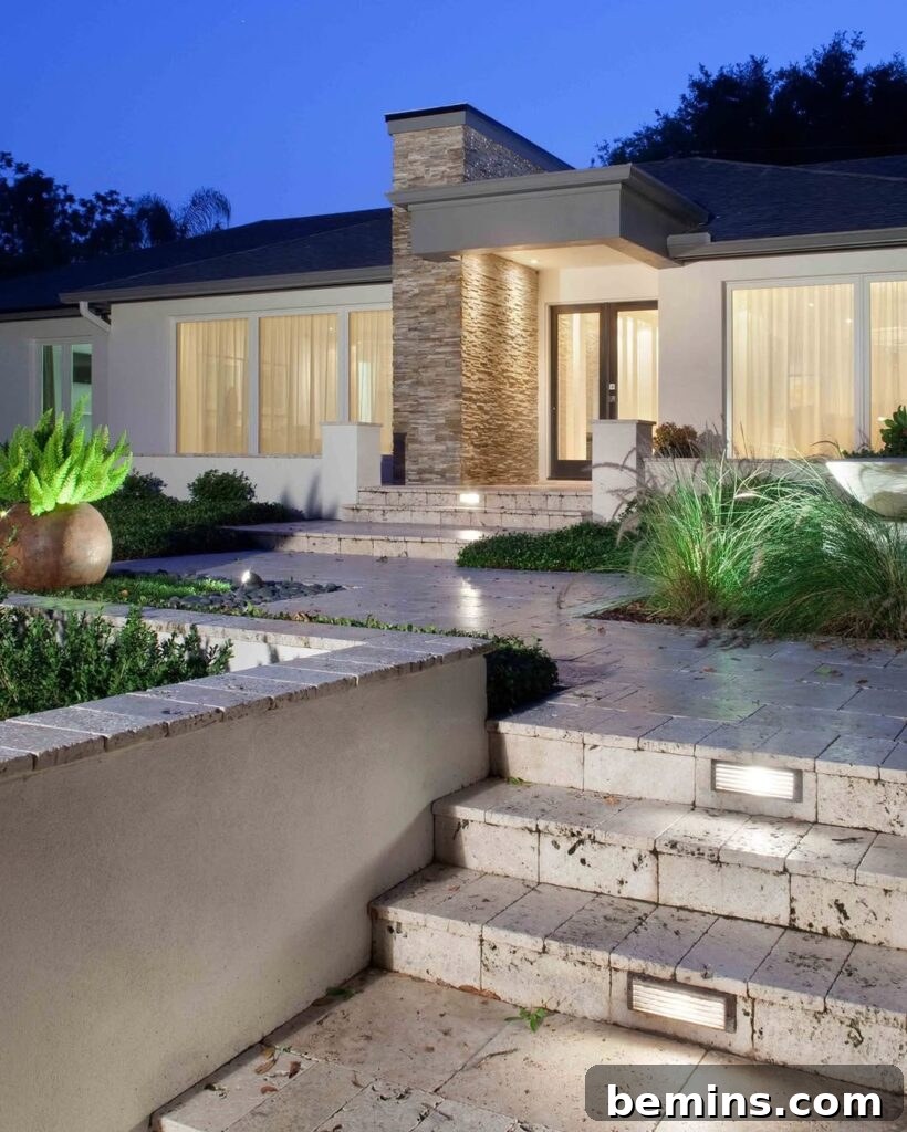 Transform Your Garden with Brilliant Uplighting Designs 5 Stone path to home entrance with subtle uplights