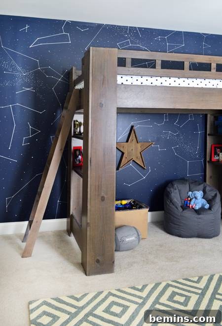Launch Their Imagination: 20 Ultimate Space-Themed Kids Room Ideas 11 A comfortable bean bag chair, shaped like an astronaut, providing cozy seating in a space-themed kids' room, perfect for reading and relaxation.