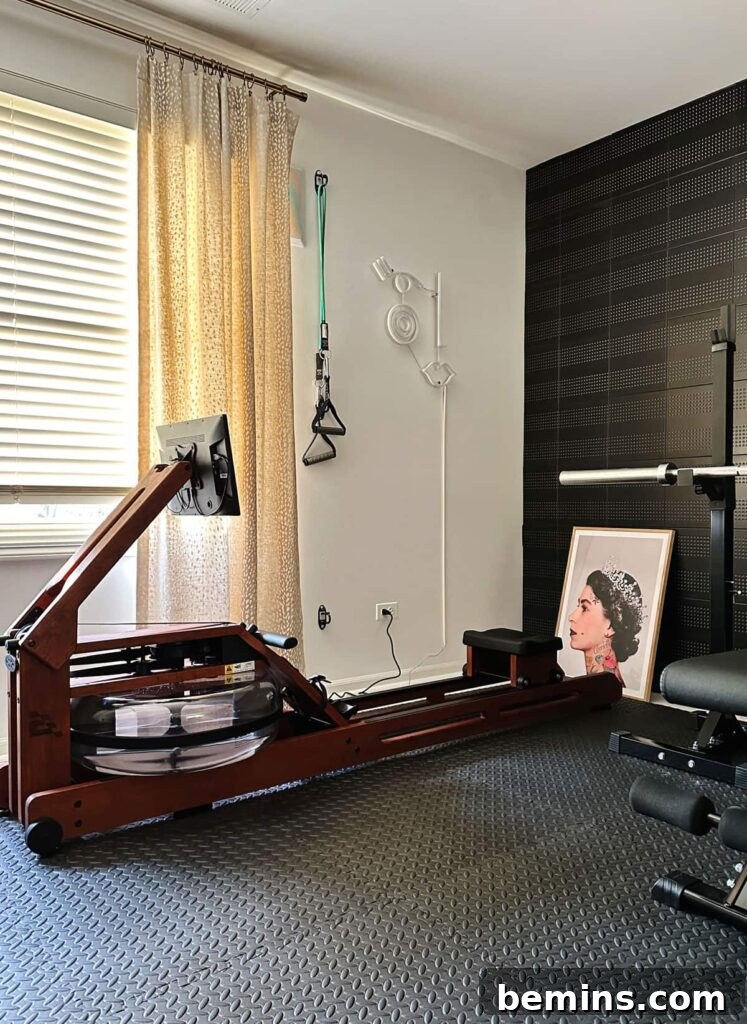 Maximizing Your Small Space: Smart Home Gym Design Ideas 4 Rower in home gym with resistance bands on wall