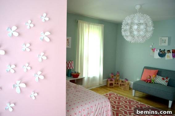 A cozy corner of Ayla's room, featuring a comfortable settee and wall decorations.