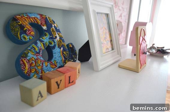 A closer look at the framed Spoonflower fabric, showcasing the intricate details.