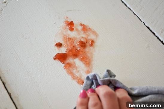 Cleaning a table with all-purpose cleaner