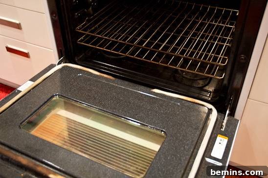 Wiping down the oven interior
