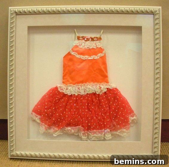 DIY Framed Pink Dress as Nursery Decor