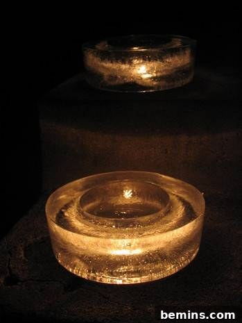 Stylish Outdoor Lighting: Complimentary 4 Elegant outdoor luminaries are displayed, showcasing their beautiful icy design and the warm, inviting light they emit.