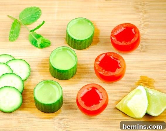 Tomato and cucumber shot glasses with cocktails