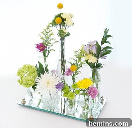 Deconstructed flower arrangement in a glass vase