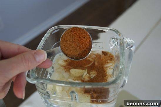 Adding a spoonful of cayenne pepper to the blender mixture