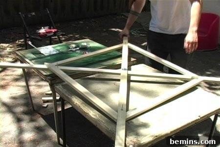 Completed wooden frame with eye bolts
