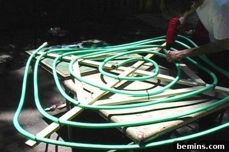 Drilling small rain holes in the garden hose