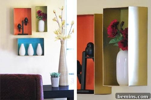 Reimagine Your Walls: 10 Upcycled DIY Art Projects 7 A number of vases and artworks in wall boxes.